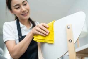 Girl-cleaning-surface-professional-cleaning-service